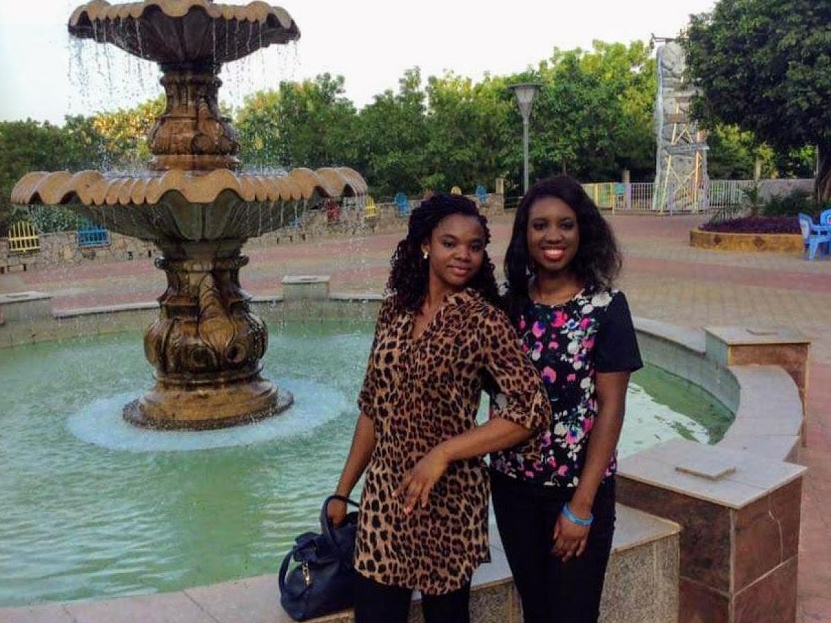 Ada (R) with a friend in Abuja, Nigeria.